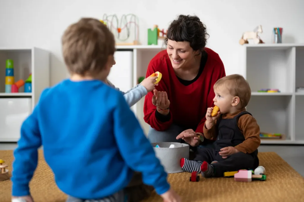  teacher helping kids learn
