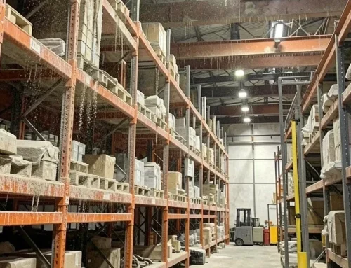 Why Dust Builds Up on Warehouse Racks, Beams, and Equipment Even After Floor Cleaning
